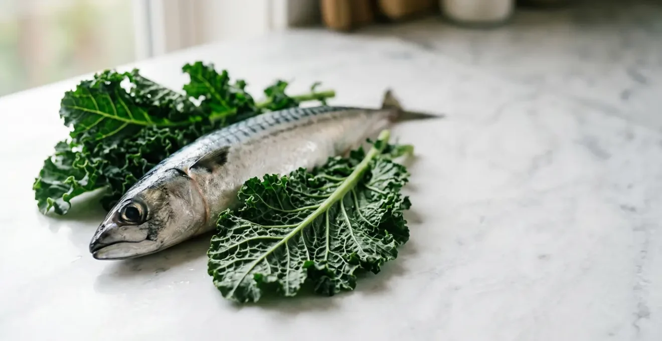 Detailed close-up of fresh leafy green vegetables and oily fish arranged on a clean surface, illustrating protective nutrition for eye health