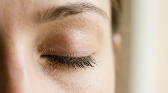 Close-up view of healthy eyelids and eyelashes showing natural hygiene and wellness