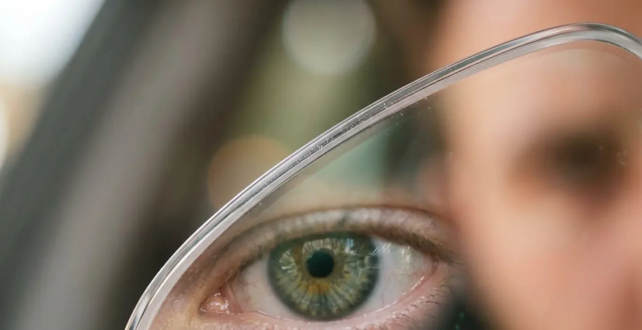 Close-up view showing precise eyeglass lens optical center alignment concept