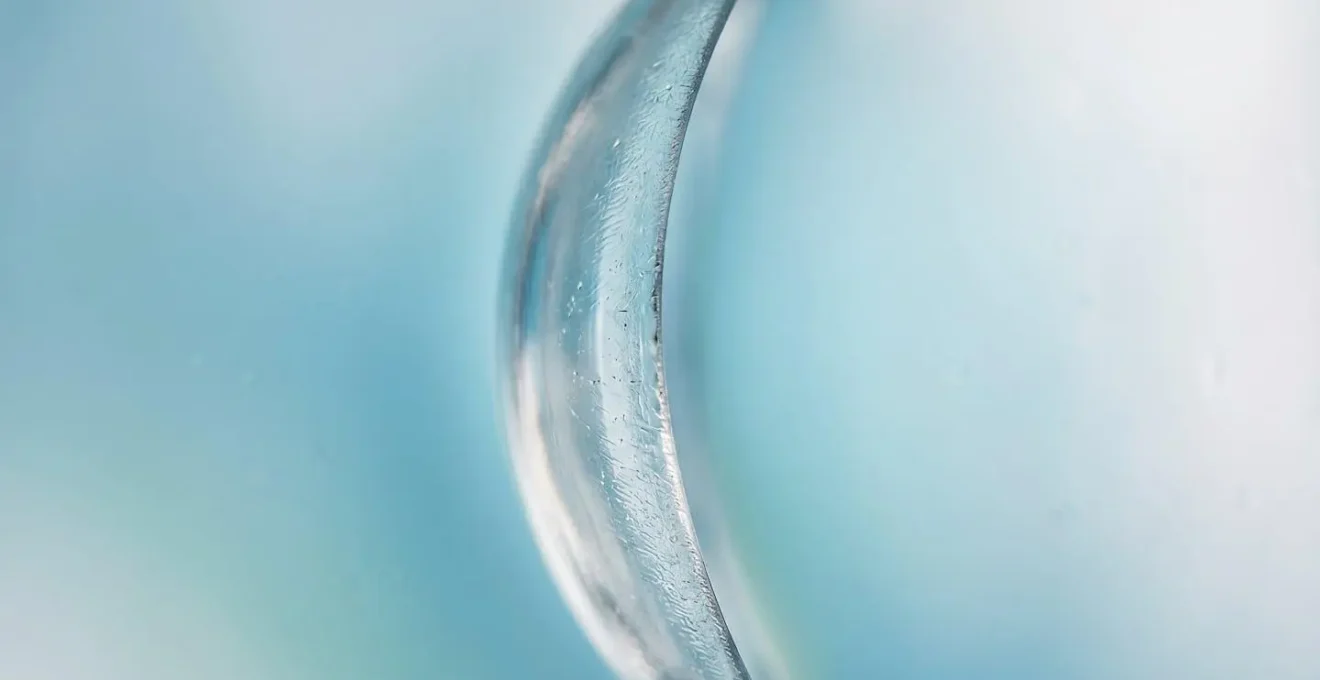 Macro view of contact lens surface showing microscopic texture and material properties
